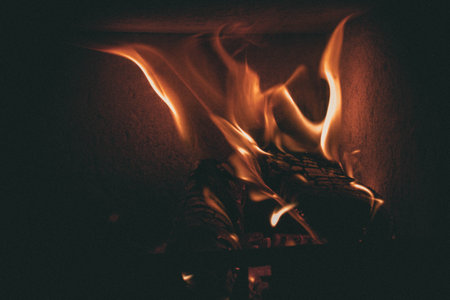 Fire in the fireplace. Close-up of fire and flames.の写真素材
