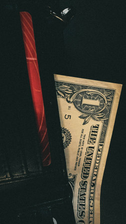 Close-up of one dollar in walletの写真素材