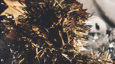 Closeup of golden christmas angel decoration. Selective focus.の写真素材