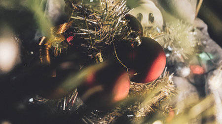 Close-up of christmas ornaments on a Christmas treeの写真素材