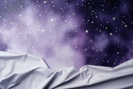crumpled white sheet of paper on the background of the night skyの素材