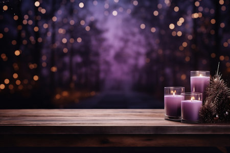 Candles on wooden table in front of blurred bokeh backgroundの素材