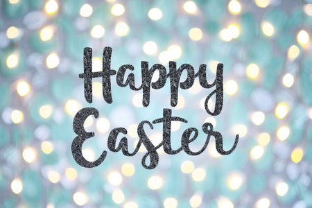 Happy Easter greeting card with text on bokeh lights background.の素材