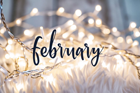 The word hello january on bokeh background, greeting cardの素材