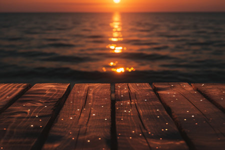 Wooden deck on the background of the sea and the sunset.の素材