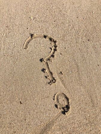 sand,question mark,painting,hand painting,concept,grain of sand,sea,graffiti,hand graffitiの写真素材