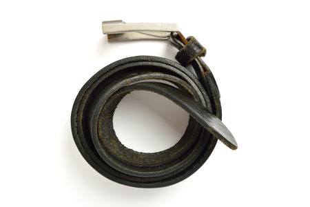 Detail of Black colored old belt and buckle