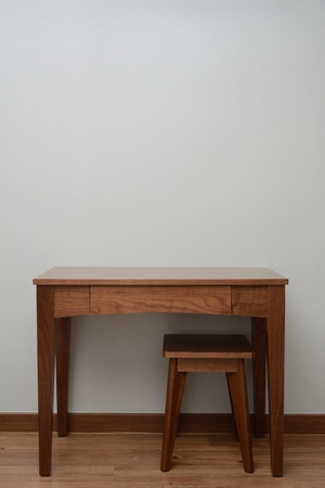 wooden Brown Table and chair in bedroomの写真素材