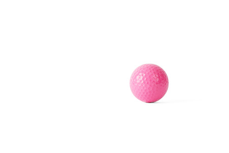 pink colored colf ball, isolated on whiteの写真素材
