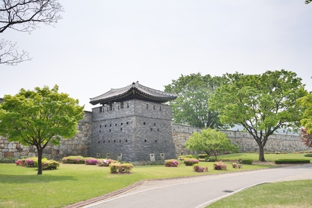 Bukseo-GunTower is adjacent to Bukseo Jeokdae. Made from black bricks, it is divided into three storeys internally by boards. Firearms were secreted on these floors. The roof is unusual in design, being gabled on the inner side (towards the wall) and anglのeditorial素材