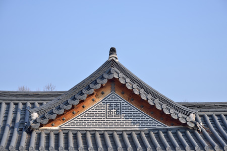 tiled roofs of Gyeongbokgung with clear sky in Seoul, Koreaのeditorial素材
