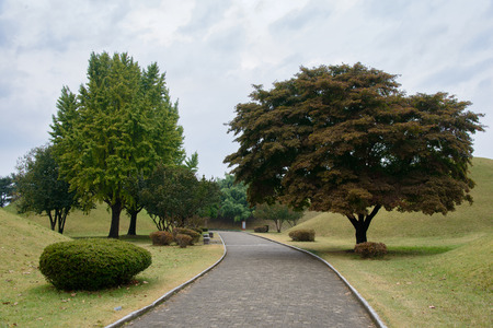 GYEONGJU, KOREA - OCTOBER 20, 2014: Daereungwon Ancient Tombs, royal tombs in the Silla Era. Located in Gyeongju, Korea.のeditorial素材
