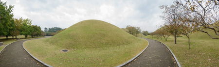 GYEONGJU, KOREA - OCTOBER 20, 2014: Daereungwon Ancient Tombs, royal tombs in the Silla Era. Located in Gyeongju, Korea.のeditorial素材