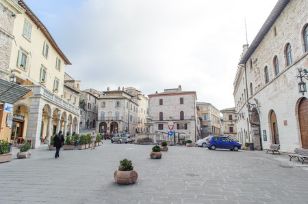 ASSISI, ITALY - JANUARY 23, 2010: View of street in Assisi. Assisi is a town in Perugia in Umbria region, Italy. it is famous for the birth place of St. Francis and the Papal Basilica of St. Francis, Basilica papale di San Francesco in Italian.のeditorial素材