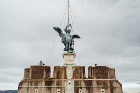 ROME, ITALY - JANUARY 27, 2010: Bronze statue of Michael the Archangel on the top of Castel Sant'Angelo in Rome, Italy.のeditorial素材