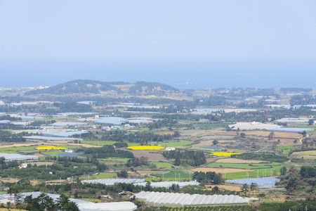Landscape view from the top of Jeoji Oreum in Jeju Island, Korea.の写真素材