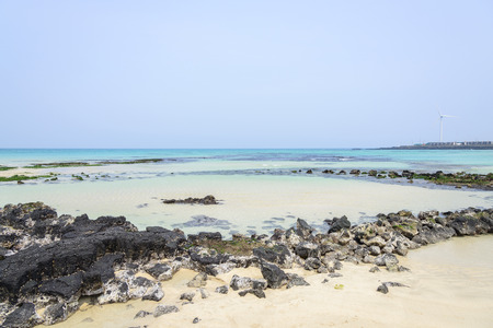 Woljeongri beach in Jeju Island, Korea. Woljeong beach is famous for white sand and beautiful scenery. And there are many beautiful cafes along the Woljeongri coast road.の写真素材