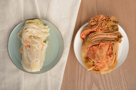 Gimchi(Kimchi) and Baek-Gimchi(white gimchi) is a traditional fermented Korean side dish made of vegetables and it is one of the most famous Korean foods.の写真素材