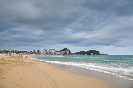 Busan, Korea - September 19, 2015: Songjeong is a beach located near the Haeundae beach in Busan. Songjeong beach has become famous for surfing place because of its clean white sand and good waves in recent years.のeditorial素材