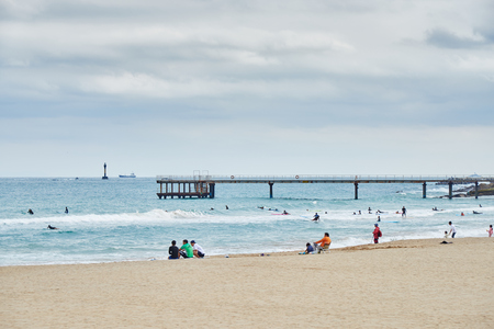 Busan, Korea - September 19, 2015: Songjeong is a beach located near the Haeundae beach in Busan. Songjeong beach has become famous for surfing place because of its clean white sand and good waves in recent years.のeditorial素材