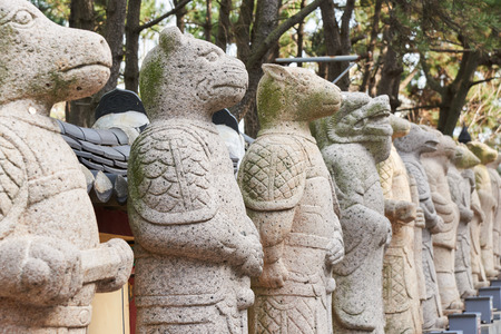 12-year cycle of the chinese zodiac statues in a templeの写真素材