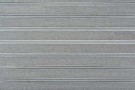 Texture of Golf club Iron face with horizontal grooves for spin.