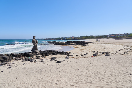 Jeju, Korea - May 26, 2017: Gwakji Gwamul beach in Aewol, Jeju island, Korea. It is a beach famous for its depth and breadth, fine sand. Near the beach there is an open-air bath with  spring water.のeditorial素材