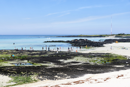Jeju, Korea - May 22, 2017: Gimnyeong Seongsegi beach in Gujwa-eup. located in the northeast of Jeju Island. The beach is popular for its fine white sand and It is part of Olle trail No.20.のeditorial素材