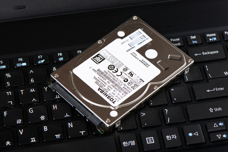 Gimpo-si, Korea - July 10, 2018: 2.5-inch SATA Hard Disk Drive (HDD), a storage device theat uses magnetic storage to store and retrieve digital data.のeditorial素材