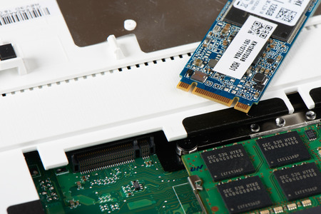 Gimpo-si, Korea - July 10, 2018: Closeup of SATA type SSD(Solid-State Drive) and M.2 connector slot on a board of laptop computer.のeditorial素材