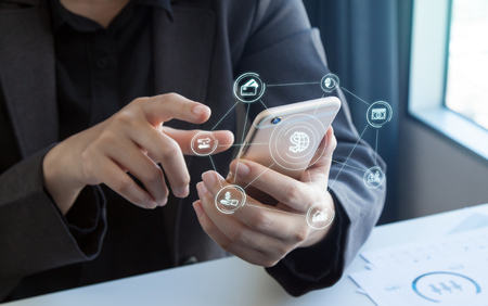 Business man using mobile payments online shopping with Mobile banking word and icon customer network connection on screen. Digital financial business conceptの写真素材