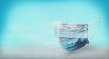 Medical mask green color background Blue antiviral medical face masks. Surgical protective masks.の写真素材