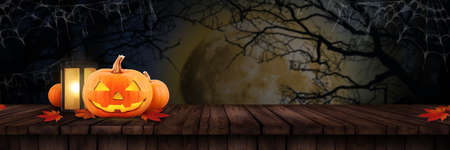 Halloween pumpkin on top Wooded Shelf ,blurred forest background,Wooden floor forest blurred and full moonの写真素材