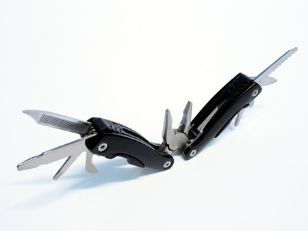 Black Swiss knife isolate on white background    の写真素材