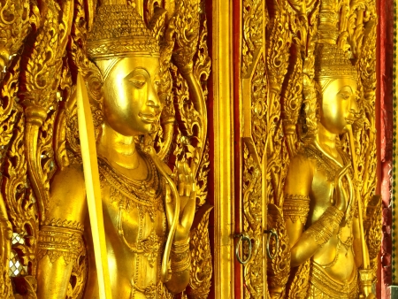 Golden door guards temple in Thailandの写真素材