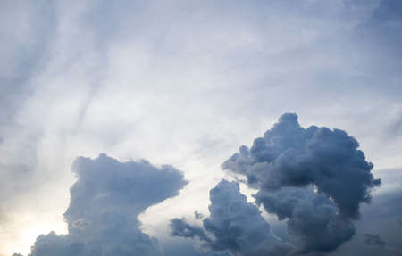 Big dark clouds in late afternoonの写真素材