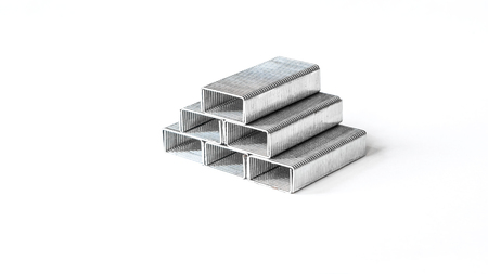 Pile of Metal Staples isolated on white background