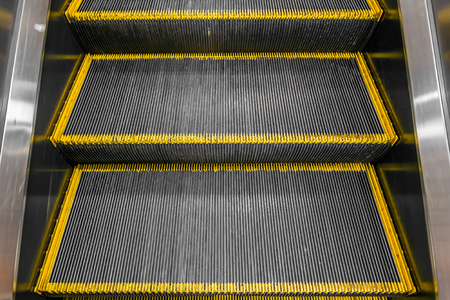 escalator for passenger in the airport view from  topの写真素材