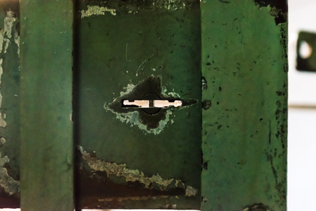 keyhole of metal folding door (old vintage concept)の写真素材