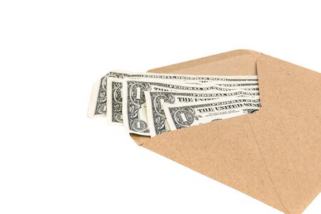 dollar money in brown envelope isolated on white background