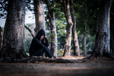 The lady may reflect on the thoughts and feelings that they are worthless unreasonable feelings of guilt or regret despair and selfloathingの写真素材