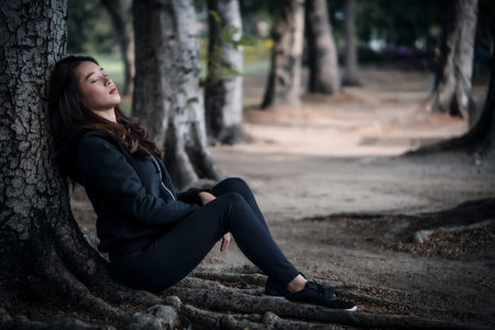 The lady may reflect on the thoughts and feelings that they are worthless unreasonable feelings of guilt or regret despair and selfloathingの写真素材