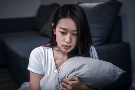 The lady may reflect on the thoughts and feelings that they are worthless unreasonable feelings of guilt or regret despair and selfloathingの写真素材