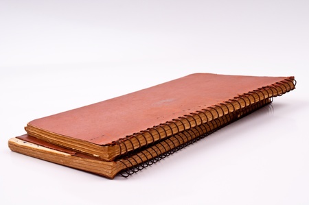 The old note book  on white background 