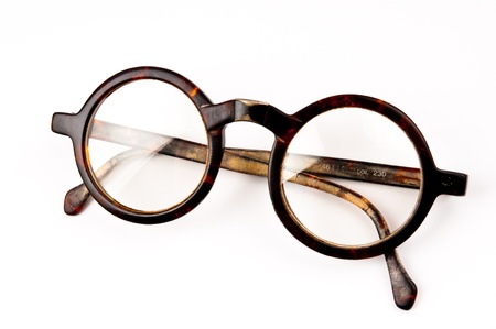 The old glasses on white background in studio The old glasses on white background in studio