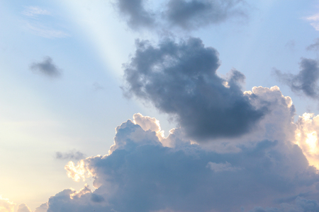 Cloudy bright blue skyの写真素材