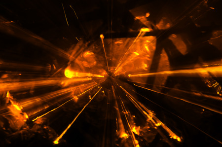 Abstract Orange light burst zoom.の写真素材