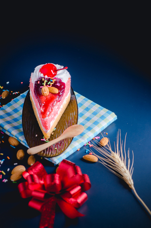 cup cheesecake on black and blue background.の写真素材