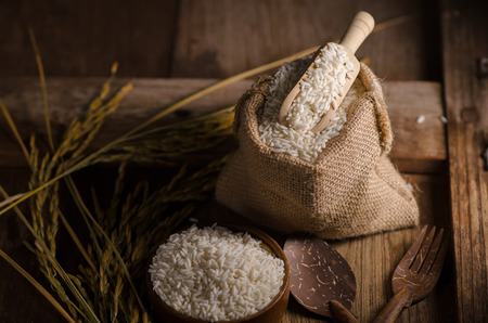Asian rice with aroma on wooden table.の写真素材