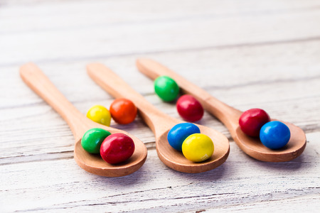 m m on the wood spoonsの写真素材